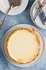 Cheesecake whole. New Yourk style. Close view. Copy space.
