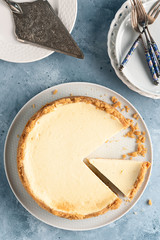 Cheesecake whole. New Yourk style. Close view. Copy space.