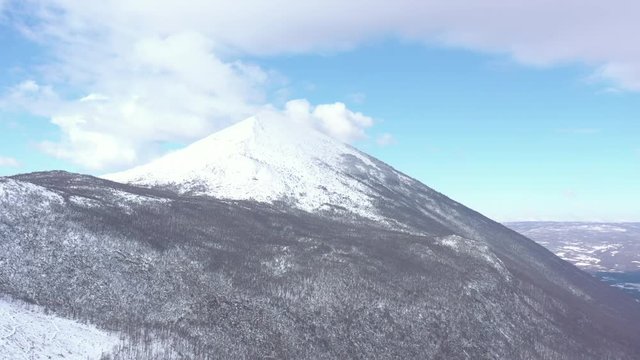 Clouds over the top of the Rtanj mountain 4K aerial video