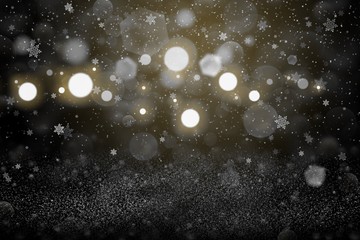 orange beautiful glossy glitter lights defocused bokeh abstract background with falling snow flakes fly, holiday mockup texture with blank space for your content