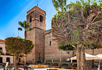 View of church tower and town hall building in old town Vera, Andalusia, Spain.