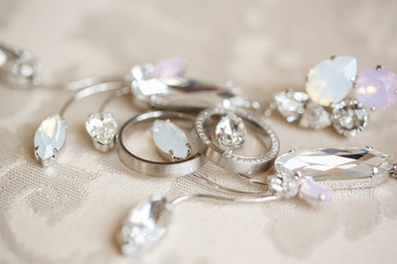 Bride's silver jewels, selective focus