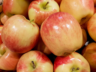 Closeup and crop California red apples background and wallpaper.