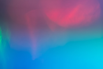 Lens flare blue pink background. Defocused gradient concept. Mulicolor background