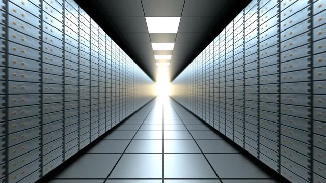 Camera moves through long bank vault room with safety deposit boxes