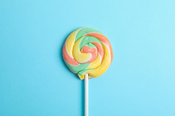 Sweet candy with space for text on color background, top view