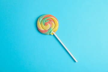 Sweet candy with space for text on color background, top view