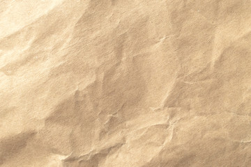 Obraz na płótnie Canvas Brown crumpled paper texture background.
