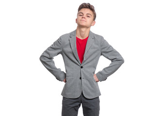 Handsome caucasian Teen Boy in suit isolated on white background. Teenager looking at camera. Happy child - close-up portrait.