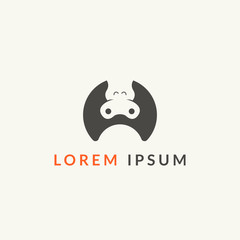 dark brown hippopotamus with happy expression in simple shape logo concept
