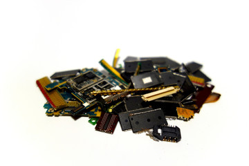 Gilded electronic and mechanical waste