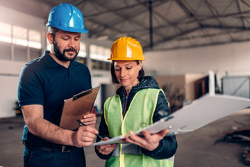 Production Line Worker signing document