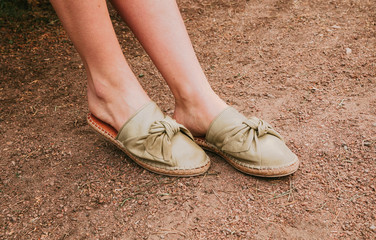 Naklejka premium Women's leather heel with an open heel. Women's summer footwear