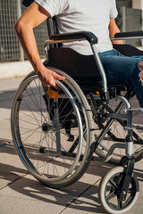 Fototapeta premium Portrait of young man on wheelchair