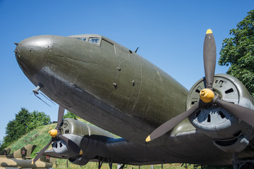 A fragment of an old transport aircraft. Engine with propeller