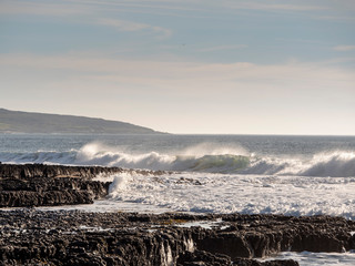 Powerful waves hit west coast of Ireland, county Clare, Ireland, cloudy day,