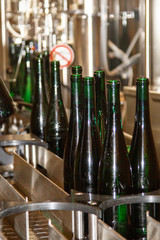in a winery wine gets bottled automatically in a filling station