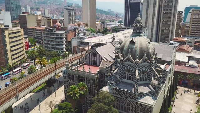 Stunning revealing aerial shot of Plaza Botero in Medellin downtown Colombia