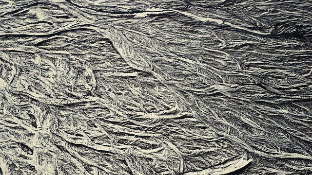 Drone showing beautiful patterns in the landscape below, on snowy conditions. Different angles, and cinematic moves. DJI Mavic Pro