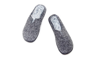 Gray male slippers on a white background