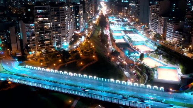 Aerial night shots with drone, hyperlapse on the Villena bridge in Miraflores Lima Peru