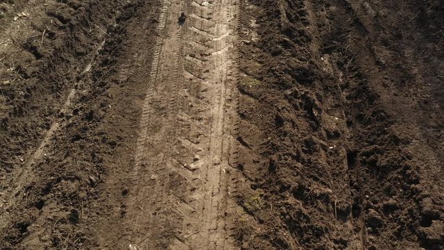 Dirt road mud after raining day 4K drone video