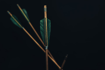 Four wood arrow. Beautiful smog background. Medieval weapons are handmade.