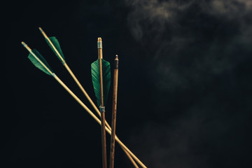 Four wood arrow. Beautiful smog background. Medieval weapons are handmade.