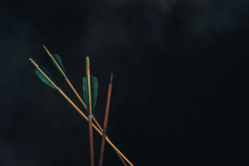 Four wood arrow. Beautiful smog background. Medieval weapons are handmade.