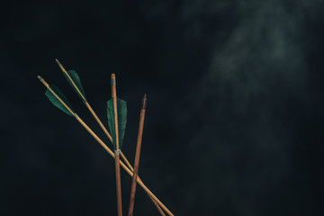 Four wood arrow. Beautiful smog background. Medieval weapons are handmade.