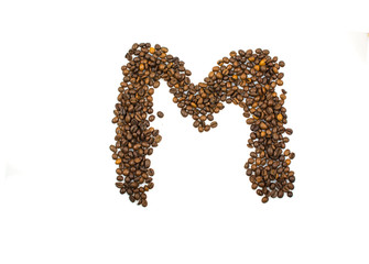 English letter M made of coffee isolated on white background
