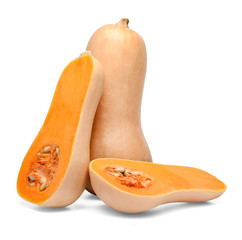 Whole and two halves of batternat pumpkin isolated on white. Close-up. Side view.