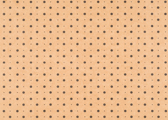 Brown craft paper with a black dot pattern