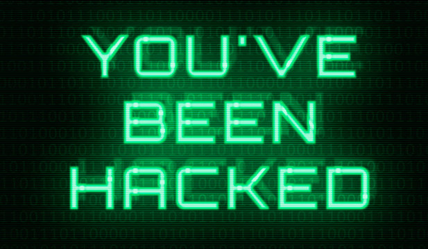 Binary code with the words You have been hacked