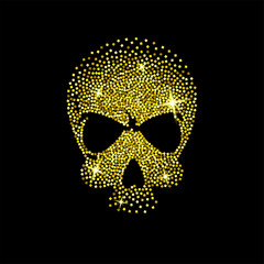 Skull made of scattered golden dust