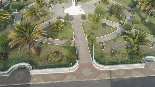 Aerial video of park during sunset of rural parish located in Cotopaxi, Ecuador.
