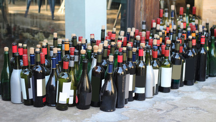 many empty wine bottles background