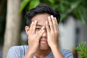 Fototapeta premium A Fearful Teen Boy