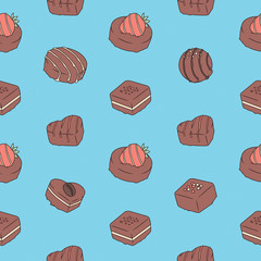 Seamless pattern with tasty looking chocolate pralines on blue background