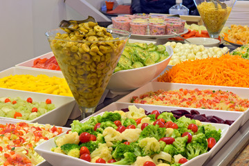 Salad dishes in self-service restaurant in Brazil