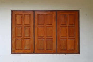 wooden window closed on white wall residential house