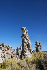 Tufa towers at Mono Lake in California against a clear blue sky