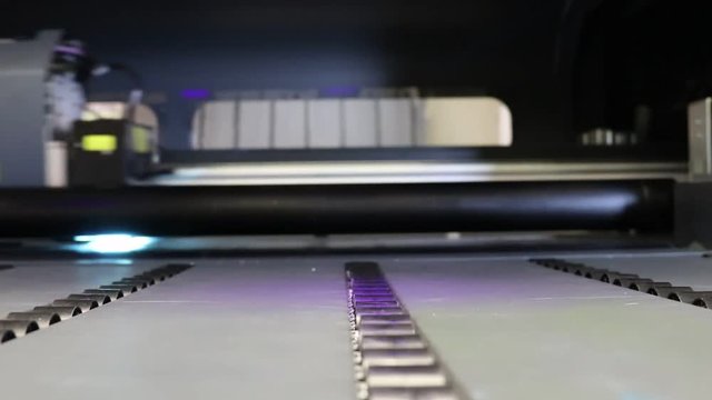 Large Industrial Printer, printing out metal signage