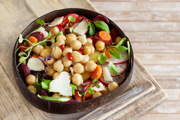 Chickpea salad with vegetables and microgreens