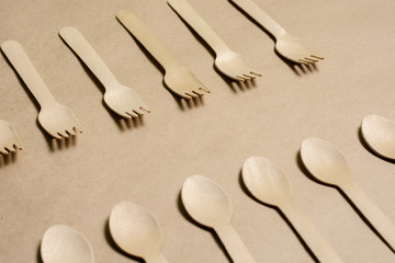 Disposable tableware from natural materials, wooden spoon, fork,  eco-friendly. Place for text