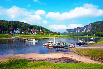A magical landscape with ferries on the river Elbe near Rathen, Germany, Europe (Sachsische Schweiz)