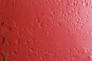 red background with water drops