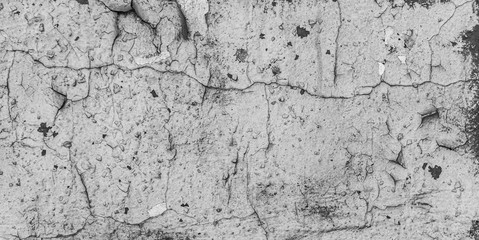 Old cracked paint on the concrete wall. Peeling paint on wall texture. Pattern of rustic blue grunge material