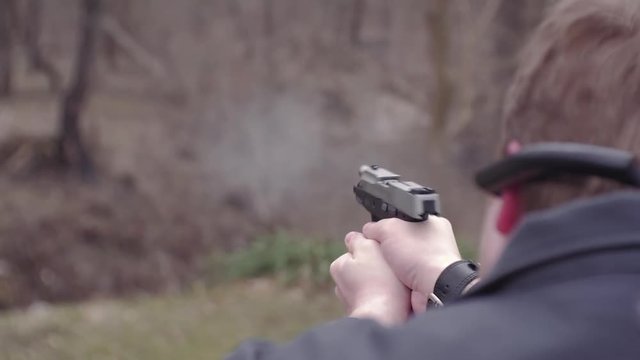 9mm handgun pistol shooting. Rapid fire.