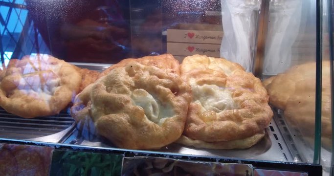 Langos, hungarian traditional street food in an eatery in the Great Market Hall.